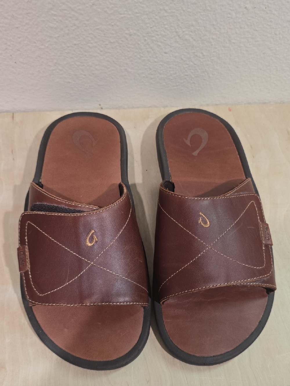 OluKai Men's Brown Leather Slide Sandals with Stitch Detail